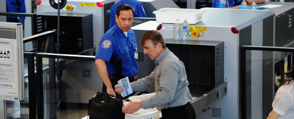 LOS ANGELES, CA - MAY 02:  Transportation Security Administration (TSA) agents screen passengers at Los Angeles International Airport on May 2, 2011 in Los Angeles, California. Security presence has been escalated at airports, train stations and public places after the killing of Osama Bin Laden by the United States in Abbottabad, Pakistan.  (Photo by Kevork Djansezian/Getty Images)